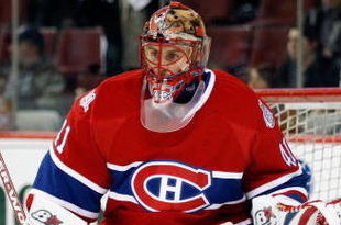 MONTREAL- APRIL 22:  Jaroslav Halak #41 of the Montreal Canadiens stops the puck during the warm up period prior to facing the Boston Bruins in Game Four of the Eastern Conference Quarterfinals of the 2009 Stanley Cup Playoffs at the Bell Centre on April 22, 2009 in Montreal, Quebec, Canada.  The Bruins defeated the Canadiens 4-1 winning the series 4-0.  (Photo by Richard Wolowicz/Getty Images)
