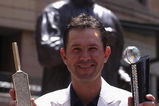 JOHANNESBURG, SOUTH AFRICA - OCTOBER 06:  Australia Cricket Team Captain Ricky Ponting poses with The ICC Champions Trophy (L) and The Leading Run Scorer of The Tournament Trophy in Nelson Mandela  Square the day after beating New Zealand in the  ICC Champions Trophy final, October 6, 2009 in Johannesburg, South Africa.  (Photo by Julian Herbert/Getty Images)