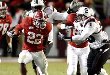 TUSCALOOSA - OCTOBER 17:  Running back Mark Ingram #22 of the Alabama Crimson Tide breaks through the line of scrimmage on a running play during the game against the South Carolina Gamecocks at Bryant-Denny Stadium on October 17, 2009 in Tuscaloosa, Alabama.  The Crimson Tide beat the Gamecocks 20-6.  (Photo by Mike Zarrilli/Getty Images)
