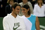 MALLORCA, SPAIN - MAY 2: Rafael Nadal of Spain and  Roger Federer of Switzerland share a joke after  the The Battle of the Surfaces between Rafael Nadal and Roger Federer at The Palma Arena on May 2, 2007 in Mallorca, Spain. (Photo by Clive Brunskill/Getty Images)