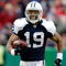 KANSAS CITY, MO - OCTOBER 11:  Miles Austin #19 of the Dallas Cowboys breaks a tackle and continues to the endzone for the first of his two touchdowns during the game against the Kansas City Chiefs on October 11, 2009 at Arrowhead Stadiumin Kansas City, Missouri.  (Photo by Jamie Squire/Getty Images)