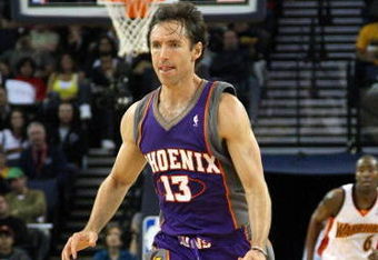 OAKLAND, CA - MARCH 15:  Steve Nash #13 of the Phoenix Suns dribbles the ball against the Golden State Warriors during an NBA game on March 15, 2009 at Oracle Arena in Oakland, California. NOTE TO USER: User expressly acknowledges and agrees that, by downloading and or using this photograph, User is consenting to the terms and conditions of the Getty Images License Agreement.  (Photo by Jed Jacobsohn/Getty Images)