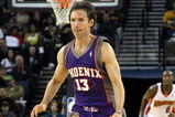 OAKLAND, CA - MARCH 15:  Steve Nash #13 of the Phoenix Suns dribbles the ball against the Golden State Warriors during an NBA game on March 15, 2009 at Oracle Arena in Oakland, California. NOTE TO USER: User expressly acknowledges and agrees that, by downloading and or using this photograph, User is consenting to the terms and conditions of the Getty Images License Agreement.  (Photo by Jed Jacobsohn/Getty Images)
