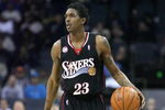 CHARLOTTE, NC - NOVEMBER 24:  Louis Williams #23 of the Philadelphia 76ers brings the ball upcourt against the Charlotte Bobcats during the game on November 24, 2008 at Charlotte Bobcats Arena in Charlotte, North Carolina.  The Bobcats won 93-84.  NOTE TO USER: User expressly acknowledges and agrees that, by downloading and/or using this Photograph, user is consenting to the terms and conditions of the Getty Images License Agreement.  (Photo by Streeter Lecka/Getty Images)