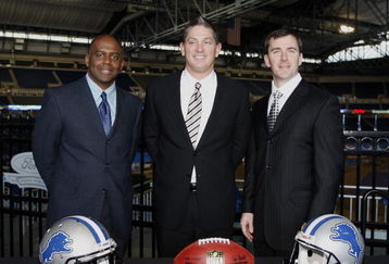 DETROIT , MI - JANUARY 16:  Jim Schwartz, center, head coach of the Detroit Lions poses with General Manager Martin Mayhew, left, and Tom Lewand team president after a press conference to introduce him as the Lions new head coach on January 16, 2009 at Ford Field in Detroit, Michigan.  (Photo by Gregory Shamus/Getty Images)