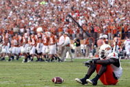 AUSTIN, TX - OCTOBER 25: Wide receiver Dez Bryant #1 of the Oklahoma State Cowboys reacts after 24-28 loss against the Texas Longhorns at Texas Memorial Stadium on October 25, 2008 in Austin, Texas. (Photo by Ronald Martinez/Getty Images)