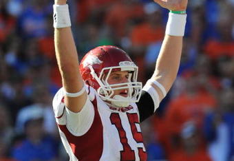 GAINESVILLE, FL - OCTOBER 17: Quarterback Ryan Mallett #15 of the Arkansas Razorbacks signals a touchdown against the Florida Gators October 17, 2009 at Ben Hill Griffin Stadium in Gainesville, Florida.  (Photo by Al Messerschmidt/Getty Images)