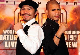 BEVERLY HILLS, CA - SEPTEMBER 14:  Manny Pacquiao and  Miguel Cotto pose for pictures during the press conference at the Beverly Hills Hotel on September 14, 2009 in Beverly Hills, California.  (Photo by Jacob de Golish/Getty Images)