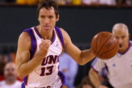 INDIAN WELLS, CA - OCTOBER 11: Steve Nash #13 of the Phoenix Suns brings the ball up court during a preseason game against the Denver Nuggets at the Indian Wells Tennis Garden on October 11, 2008 in Palm Springs, California. The Nuggets won 77-72. NOTE TO USER: User expressly acknowledges and agrees that, by downloading and or using this Photograph, user is consenting to the terms and conditions of the Getty Images License Agreement. (Photo by Jeff Gross/Getty Images)