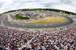 LOUDON, NH - JULY 01:  Cars race during the NASCAR Nextel Cup Series Lenox Industrial Tools 300 at New Hampshire International Speedway on July 1, 2007 in Loudon, New Hampshire.  (Photo by Matthew Stockman/Getty Images)