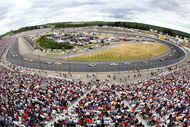 LOUDON, NH - JULY 01: Cars race during the NASCAR Nextel Cup Series Lenox Industrial Tools 300 at New Hampshire International Speedway on July 1, 2007 in Loudon, New Hampshire. (Photo by Matthew Stockman/Getty Images)