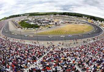 LOUDON, NH - JULY 01:  Cars race during the NASCAR Nextel Cup Series Lenox Industrial Tools 300 at New Hampshire International Speedway on July 1, 2007 in Loudon, New Hampshire.  (Photo by Matthew Stockman/Getty Images)