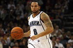 LONDON, ENGLAND - OCTOBER 06:  Deron Williams of the Utah Jazz in action during the NBA pre-season game as part of the 2009 NBA Europe Live Tour between Chicago Bulls and Utah Jazz at the O2 Arena on October 6, 2009 in London, England.  NOTE TO USER: User expressly acknowledges and agrees that, by downloading and/or using this Photograph, user is consenting to the terms and conditions of the Getty Images License Agreement.  (Photo by Bryn Lennon/Getty Images)