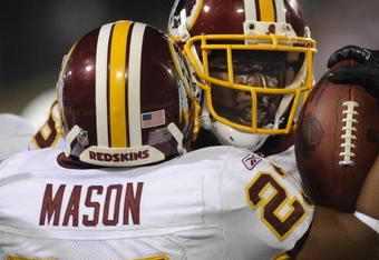CANTON, OH - AUGUST 3: Tight end Fred Davis #86 of the Washington Redskins hugs running back Marcus Mason after a touchdown catch against the Indianapolis Colts in the Pro Football Hall of Fame Game at Fawcett Stadium on August 3, 2008 in Canton, Ohio.   (Photo by Al Messerschmidt/Getty Images)