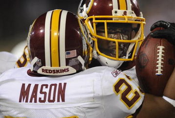 CANTON, OH - AUGUST 3: Tight end Fred Davis #86 of the Washington Redskins hugs running back Marcus Mason after a touchdown catch against the Indianapolis Colts in the Pro Football Hall of Fame Game at Fawcett Stadium on August 3, 2008 in Canton, Ohio.   (Photo by Al Messerschmidt/Getty Images)