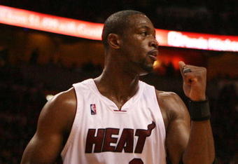 MIAMI - MAY 01:  Dwyane Wade #3 of the Miami Heat pumps his fist after the heat get a stop in the fourth quarter against the Atlanta Hawks during Game Six of the Eastern Conference Quarterfinals at American Airlines Arena on May 1, 2009 in Miami, Florida. The Heat defeated the Hawks 98-72. NOTE TO USER: User expressly acknowledges and agrees that, by downloading and/or using this Photograph, user is consenting to the terms and conditions of the Getty Images License Agreement.  (Photo by Doug Benc/Getty Images)