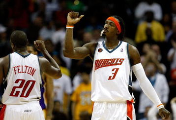 CHARLOTTE, NC - MARCH 31:  Gerald Wallace #3 and Raymond Felton #20 of the Charlotte Bobcats react after a play during their game against the Los Angeles Lakers at Time Warner Cable Arena on March 31, 2009 in Charlotte, North Carolina.  NOTE TO USER: User expressly acknowledges and agrees that, by downloading and/or using this Photograph, user is consenting to the terms and conditions of the Getty Images License Agreement.  (Photo by Streeter Lecka/Getty Images)