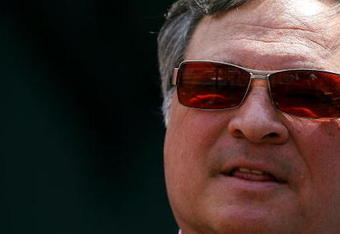 MIAMI - APRIL 06:  Owner Jeffrey Loria of the Florida Marlins watches the Washington Nationals take batting practice on opening day at Dolphin Stadium on April 6, 2009 in Miami, Florida.  (Photo by Doug Benc/Getty Images)