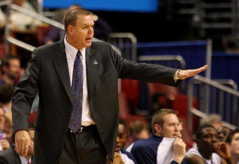 PHILADELPHIA - MARCH 19:  Dave Rose, head coach of the Brigham Young Cougars, communicates with the team during the first round of the NCAA Division I Men's Basketball Tournament against the Texas A&M Aggies at the Wachovia Center on March 19, 2009 in Philadelphia, Pennsylvania.  (Photo by Jim McIsaac/Getty Images)