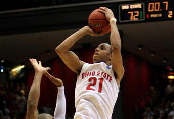 DAYTON, OH - MARCH 20: Evan Turner#21 of the Ohio State Buckeyes shoots over Kenny Hasbrouck #41 of the Siena Saints during the first round of the NCAA Division I Men's Basketball Tournament at the University of Dayton Arena on March 20, 2009 in Dayton, Ohio.  (Photo by Andy Lyons/Getty Images)