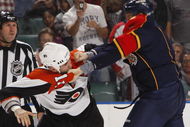 SUNRISE, FL - OCTOBER 16: Bryan Allen #5 of the Florida Panthers and Ian Laperriere #14 of the Philadelphia Flyers fight during the second period on October 16, 2009 at the BankAtlantic Center in Sunrise, Florida. (Photo by Joel Auerbach/Getty Images)