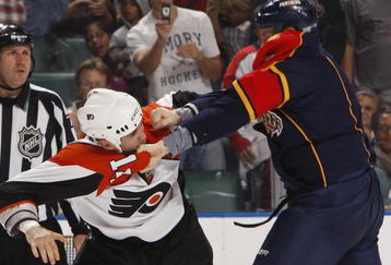 SUNRISE, FL - OCTOBER 16: Bryan Allen #5 of the Florida Panthers and Ian Laperriere #14 of the Philadelphia Flyers fight during the second period on October 16, 2009 at the BankAtlantic Center in Sunrise, Florida. (Photo by Joel Auerbach/Getty Images)