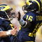 ANN ARBOR, MI - SEPTEMBER 05:  Tate Forcier #5 of the Michigan Wolverines celebrates with Denard Robinson #16 after Robinson ran for a long first quarter touchdown against the Western Michigan Broncos on September 5, 2009 at Michigan Stadium in Ann Arbor, Michigan.  (Photo by Gregory Shamus/Getty Images)