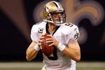 NEW ORLEANS - OCTOBER 18:  Drew Brees #9 of the New Orleans Saints throws a pass against the New York Giants at the Louisiana Superdome on October 18, 2009 in New Orleans, Louisiana.  The Saints defeated the Giants 48-27.  (Photo by Chris Graythen/Getty Images)