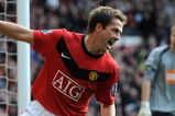 MANCHESTER, ENGLAND - OCTOBER 17:  Michael Owen of Manchester United celebrates the first goal after Zat Knight of Bolton Wanderers scores an own goal during the Barclays Premier League match between Manchester United and Bolton Wanderers at Old Trafford on October 17, 2009 in Manchester, England.  (Photo by Laurence Griffiths/Getty Images)