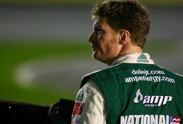 CONCORD, NC - OCTOBER 15:  Dale Earnhardt Jr., driver of the #88 AMP Energy Chevrolet, stands on pit road during qualifying for the NASCAR Sprint Cup Series NASCAR Banking 500 at Lowe's Motor Speedway on October 15, 2009 in Concord, North Carolina.  (Photo by Jason Smith/Getty Images for NASCAR)
