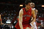 MIAMI - NOVEMBER 19:  Andrea Bargnani #7 of the Toronto Raptors drives past Daequan Cook #14 of the Miami Heat at American Airlines Arena on November 19, 2008 in Miami, Florida. The Raptors defeated the Heat 101-95. NOTE TO USER: User expressly acknowledges and agrees that, by downloading and/or using this Photograph, user is consenting to the terms and conditions of the Getty Images License Agreement.  (Photo by Doug Benc/Getty Images)