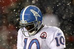 FOXBORO - OCTOBER 18:  Vince Young #10 of the Tennessee Titans  leaves the field in the fourth quarter during a game against the New England Patriots converse at Gillette Stadium on October 18, 2009 in Foxboro, Massachusetts. The Patriots won 59-0. (Photo by Jim Rogash/Getty Images)