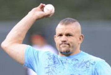 BALTIMORE - AUGUST 31: Chuck Liddell throws out the first pitch before the game between the New York Yankees and the Baltimore Orioles on August 31, 2009 at Camden Yards in Baltimore, Maryland.  (Photo by Greg Fiume/Getty Images)