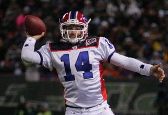 EAST RUTHERFORD, NJ - OCTOBER 18: Ryan Fitzpatrick #14 of the Buffalo Bills throws on the run against the New York Jets during the game on October 18, 2009 at Giants Stadium in East Rutherford, New Jersey. The Bills defeated the Jets 16-13 in overtime. (Photo by Jared Wickerham/Getty Images)