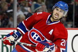 MONTREAL- OCTOBER 17:  Brian Gionta #21 of the Montreal Canadiens skates during the NHL game against the Ottawa Senators on October 17, 2009 at the Bell Centre in Montreal, Quebec, Canada.  The Senators defeated the Canadiens 3-1.  (Photo by Richard Wolowicz/Getty Images)