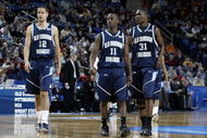 BUFFALO, NY - MARCH 15: Gerald Lee #12 Abdi Lidonde #11 and Arnaud Dahi #31 of the Old Dominion Monarchs stand on the court against the Butler Bulldogs during round one of the NCAA Men's Basketball Tournament at the HSBC Arena on March 15, 2007 in Buffalo, New York. (Photo by Rick Stewart/Getty Images)
