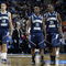 BUFFALO, NY - MARCH 15: Gerald Lee #12 Abdi Lidonde #11 and Arnaud Dahi #31 of the Old Dominion Monarchs stand on the court against the Butler Bulldogs during round one of the NCAA Men's Basketball Tournament at the HSBC Arena on March 15, 2007 in Buffalo, New York. (Photo by Rick Stewart/Getty Images)