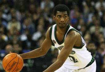 LONDON - OCTOBER 10:  Corey Brewer #22 of Minnesota runs with the ball during NBA Europe Live 2007 Tour match between the Boston Celtics and the Minnesota Timberwolves at the O2 Arena on October 10, 2007 in London, England.  NOTE TO USER: User expressly acknowledges and agrees that, by downloading and or using this Photograph, user is consenting to the terms and conditions of the Getty Images License Agreement.  (Photo by Bryn Lennon/Getty Images)