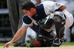 NEW YORK - AUGUST 10:  Jorge Posada #20 of the New York Yankees writes in the dirt at home plate during the game against the Toronto Blue Jays on August 12, 2009 at Yankee Stadium in the Bronx Borough of New York City. (Photo by Jared Wickerham/Getty Images)