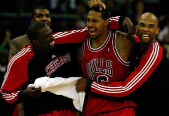 LONDON, ENGLAND - OCTOBER 06:  James Johnson (C) of the Chicago Bulls celebrates with team mates after scoring the winning shot in the final second during the NBA pre-season game as part of the 2009 NBA Europe Live Tour between Chicago Bulls and Utah Jazz at the O2 Arena on October 6, 2009 in London, England.  NOTE TO USER: User expressly acknowledges and agrees that, by downloading and/or using this Photograph, user is consenting to the terms and conditions of the Getty Images License Agreement.  (Photo by Clive Rose/Getty Images)