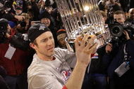 PHILADELPHIA - OCTOBER 29:  Chase Utley #26 of the Philadelphia Phillies celebrates with the World Series trophy after their 4-3 win against the Tampa Bay Rays during the continuation of game five of the 2008 MLB World Series on October 29, 2008 at Citizens Bank Park in Philadelphia, Pennsylvania.  (Photo by Doug Pensinger/Getty Images)