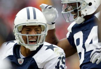 KANSAS CITY, MO - OCTOBER 11:  Miles Austin #19 of the Dallas Cowboys celebrates a touchdown with Patrick Crayton #84 during the game against the Kansas City Chiefs on October 11, 2009 at Arrowhead Stadiumin Kansas City, Missouri.  (Photo by Jamie Squire/Getty Images)