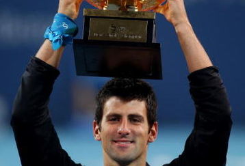 BEIJING - OCTOBER 11:  Novak Djokovic of Serbia poses with his trophy after victory against Marin Cilic of Croatia in the men's final match on day ten of the 2009 China Open at the National Tennis Centre on October 11, 2009 in Beijing, China. (Photo by Feng Li/Getty Images)