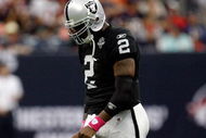 HOUSTON - OCTOBER 04:  Quarterback JaMarcus Russell #2 of the Oakland Raiders walks off the field during play against the Houston Texans at Reliant Stadium on October 4, 2009 in Houston, Texas.  (Photo by Ronald Martinez/Getty Images)