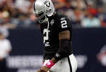 HOUSTON - OCTOBER 04:  Quarterback JaMarcus Russell #2 of the Oakland Raiders walks off the field during play against the Houston Texans at Reliant Stadium on October 4, 2009 in Houston, Texas.  (Photo by Ronald Martinez/Getty Images)