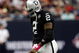 HOUSTON - OCTOBER 04:  Quarterback JaMarcus Russell #2 of the Oakland Raiders walks off the field during play against the Houston Texans at Reliant Stadium on October 4, 2009 in Houston, Texas.  (Photo by Ronald Martinez/Getty Images)