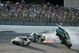 TALLADEGA, AL - APRIL 26:  Carl Edwards, driver of the #99 Claritin Ford, goes airborne as Ryan Newman, driver of the #39 Steweart-Haas Racing Chevrolet suffers damage and Brad Keselowski, driver of the #09 Miccosukee Indian Gaming Chevrolet drives at the conclusion of the NASCAR Sprint Cup Series Aaron's 499 at Talladega Superspeedway on April 26, 2009 in Talladega, Alabama.  (Photo by Jerry Markland/Getty Images for NASCAR)