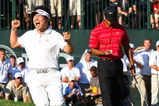 CHASKA, MN - AUGUST 16:  (L-R) Y.E. Yang of South Korea celebrates a birdie putt on the 18th green alongside Tiger Woods during the final round of the 91st PGA Championship at Hazeltine National Golf Club on August 16, 2009 in Chaska, Minnesota.  (Photo by David Cannon/Getty Images)