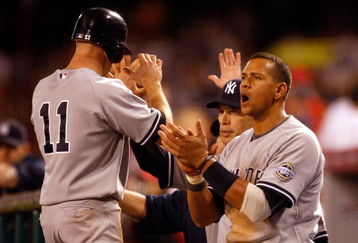 ANAHEIM, CA - OCTOBER 20:  Alex Rodriguez #13 (R) of the New York Yankees cheers on his teammates during the ninth inning in Game Four of the ALCS against the Los Angeles Angels of Anaheim during the 2009 MLB Playoffs at Angel Stadium on October 20, 2009 in Anaheim, California.  (Photo by Jeff Gross/Getty Images)