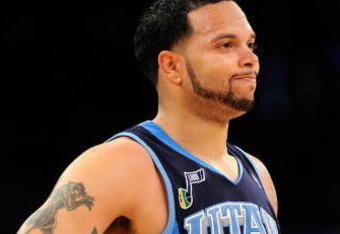 LOS ANGELES, CA - APRIL 21:  Deron Williams #8 of the Utah Jazz looks on against the Los Angeles Lakers in Game Two of the Western Conference Quarterfinals during the 2009 NBA Playoffs at Staples Center on April 21, 2009 in Los Angeles, California. NOTE TO USER: User expressly acknowledges and agrees that, by downloading and or using this photograph, User is consenting to the terms and conditions of the Getty Images License Agreement.  (Photo by Kevork Djansezian/Getty Images)